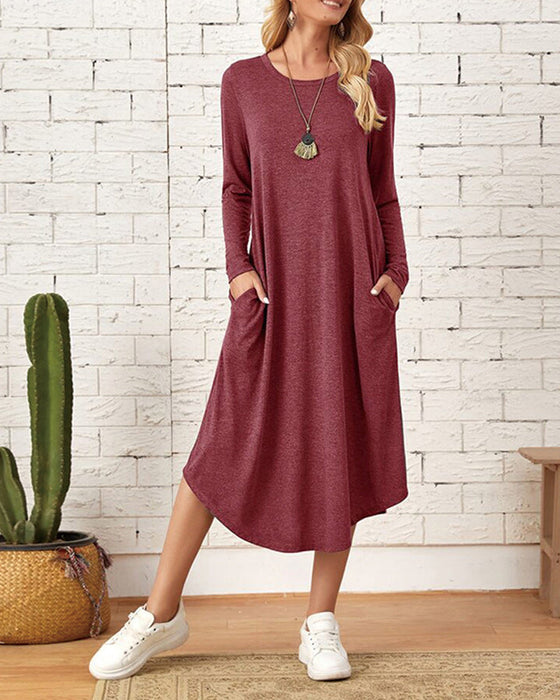 Robe incurvée ample à manches longues